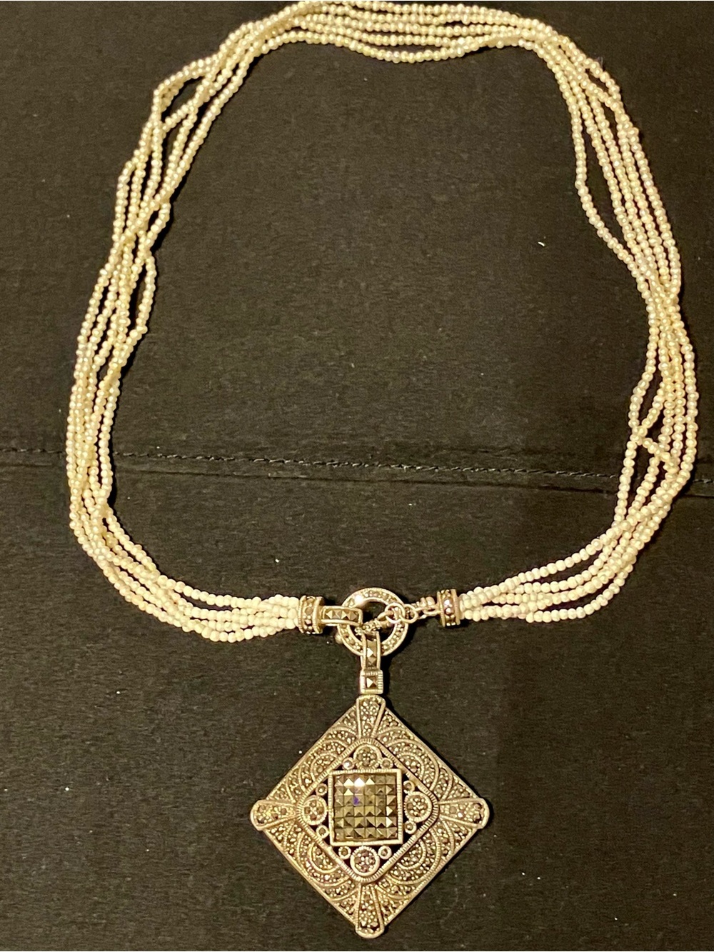 Multi-Strand Cream Pearl Necklace with Filigree Silver Pendant